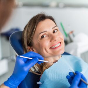 smiling woman at dentist