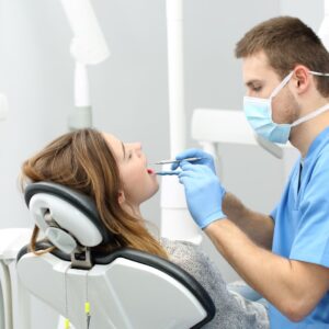 woman getting her teeth cleaned