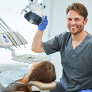 dentist X-raying patient's teeth