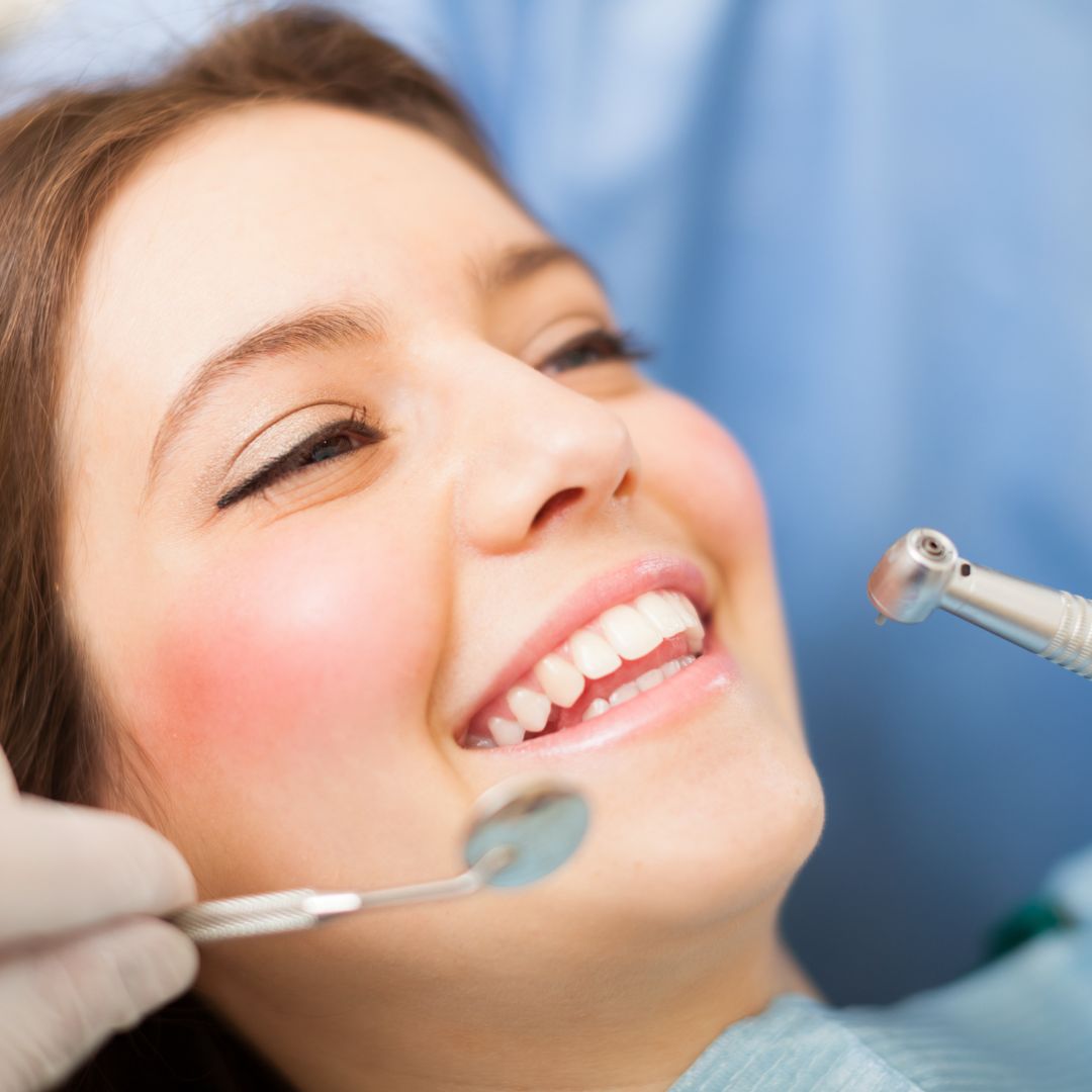woman getting dental exam