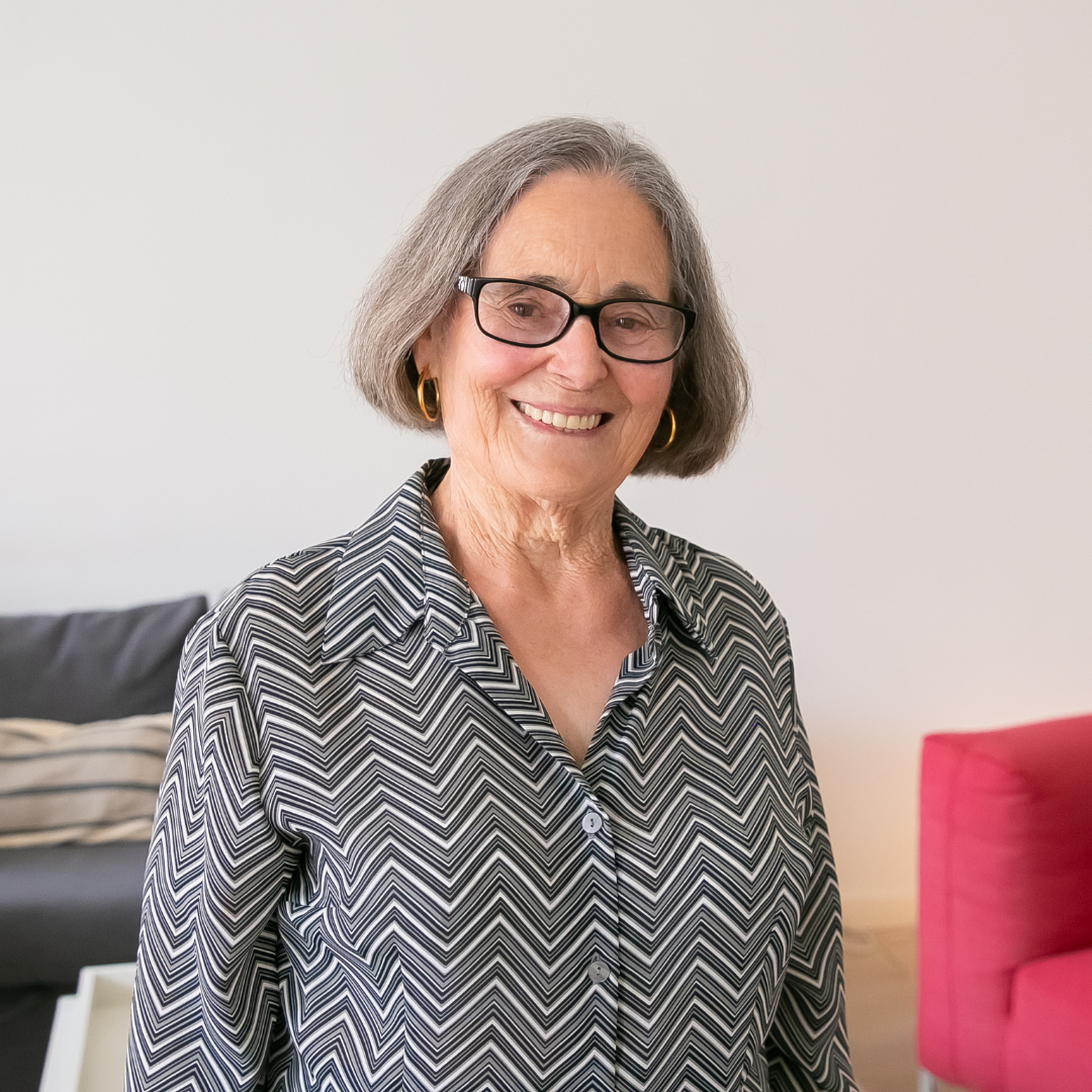 A senior woman smiling