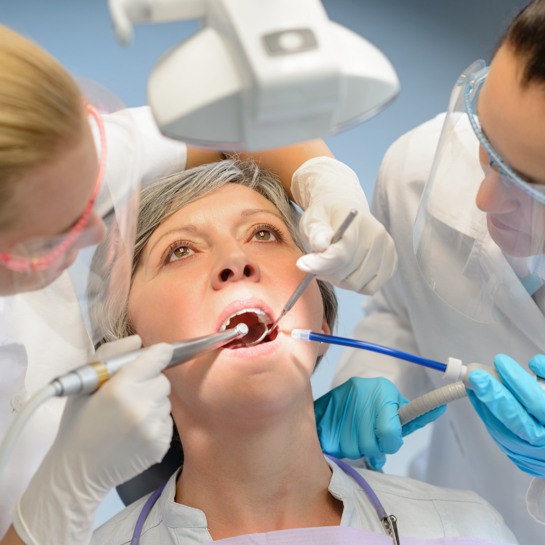 A senior woman at the dentist